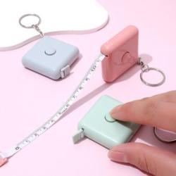 A 1.5-meter mini dual scale square multifunctional tape measure used for measuring chest, hip, and w